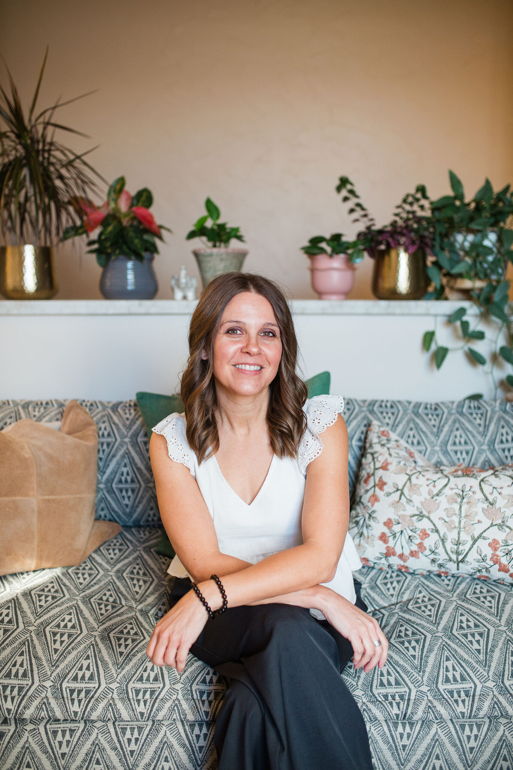 Trauma therapist seated in a calm office space, representing work with men experiencing emotional shutdown, shame collapse, and the effects of religious trauma.